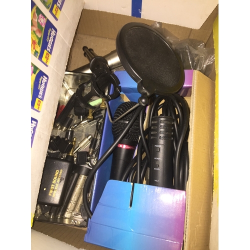 354 - A box with three microphones and various adapters