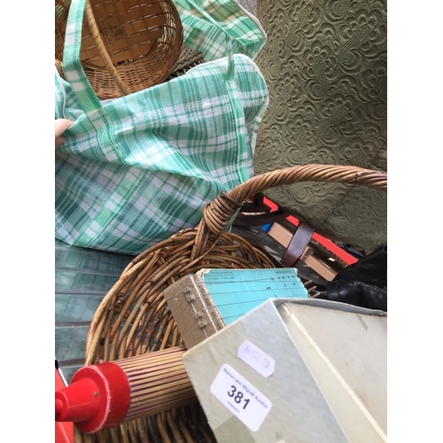 381 - A bag with large quantity of wicker baskets, bowls, etc and a wicker flower basket with contents to ... 