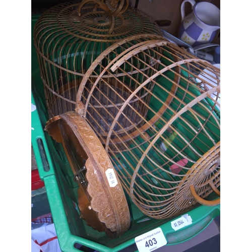 403 - Two vintage wooden bird cages