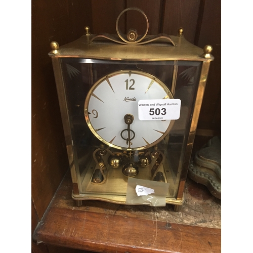 503 - Four glass brass clock