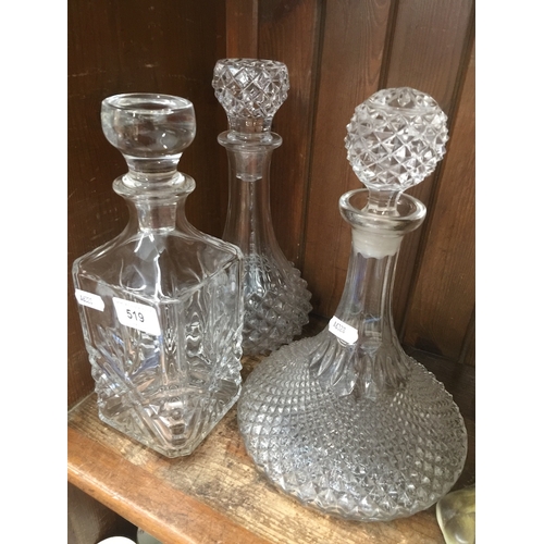 519 - Three glass decanters