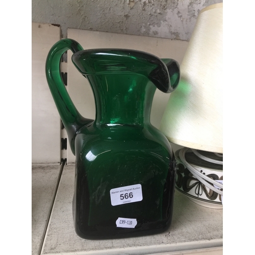 566 - A green glass heavy jug