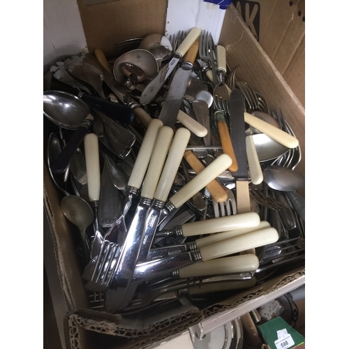 583 - A box of plated cutlery