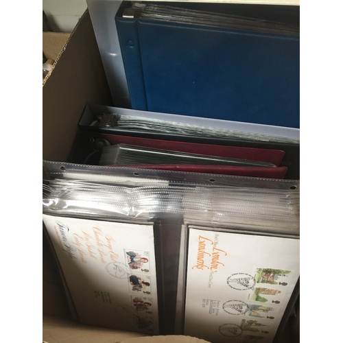 584 - A box of first day covers and silks