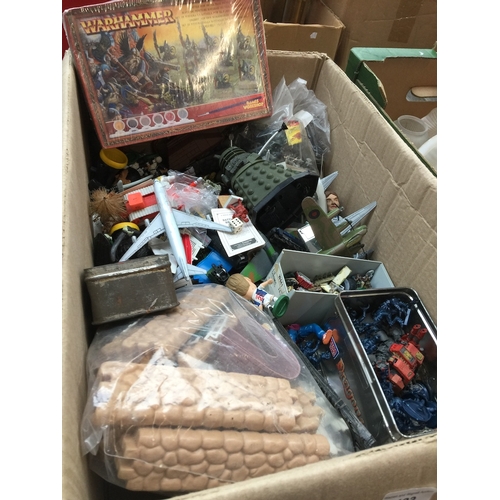 423 - A box of mixed toys including soldiers, Dalek, etc.