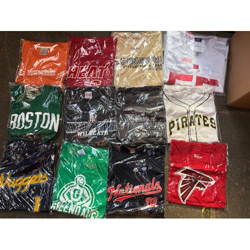 256 - A box containing approx 21 american sports shirts