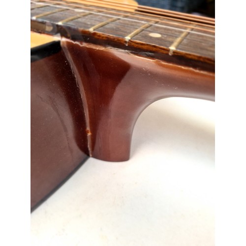 91 - An Encore electro acoustic guitar - as found