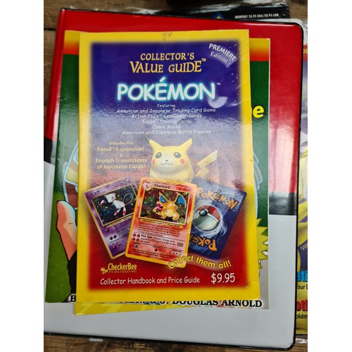 429 - A good collection of Pokemon cards and magazines - as seen, no returns.