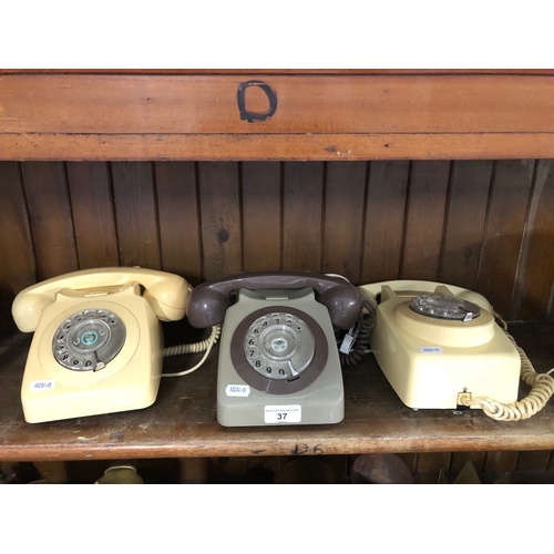 37 - Three vintage telephones