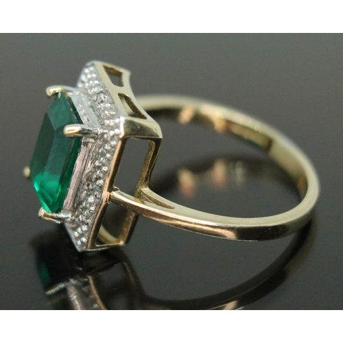 151 - A hallmarked 9ct gold synthetic emerald and diamond ring, gross weight 2.89g, size O.