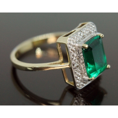 151 - A hallmarked 9ct gold synthetic emerald and diamond ring, gross weight 2.89g, size O.