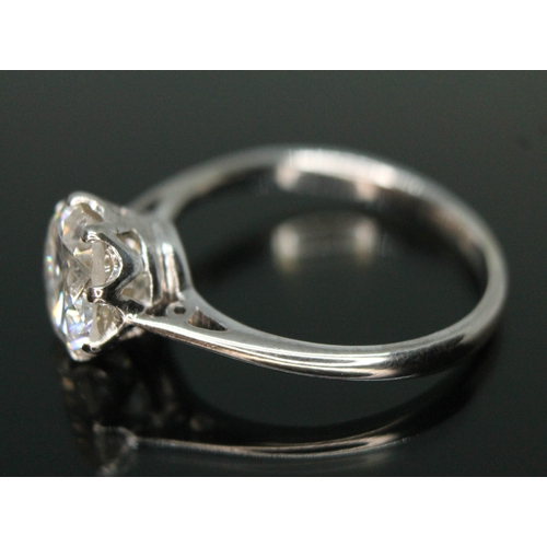 287 - A diamond solitaire ring, early 20th century, the eight claw set slight oval brilliant cut diamond w... 