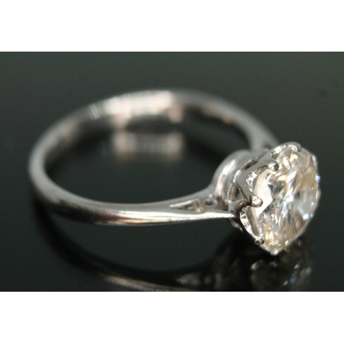 287 - A diamond solitaire ring, early 20th century, the eight claw set slight oval brilliant cut diamond w... 