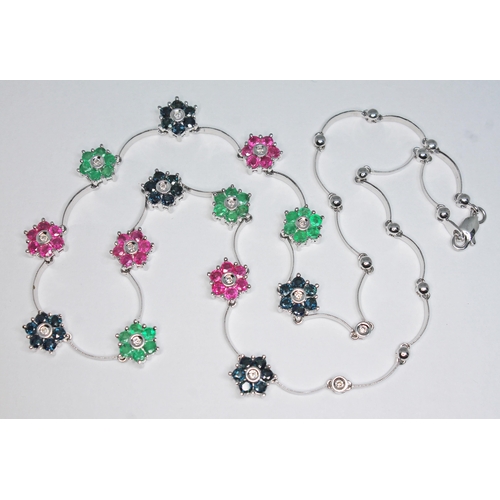 180 - A diamond, sapphire, ruby and emerald necklace, featuring thirteen alternate seven stone clusters wi... 