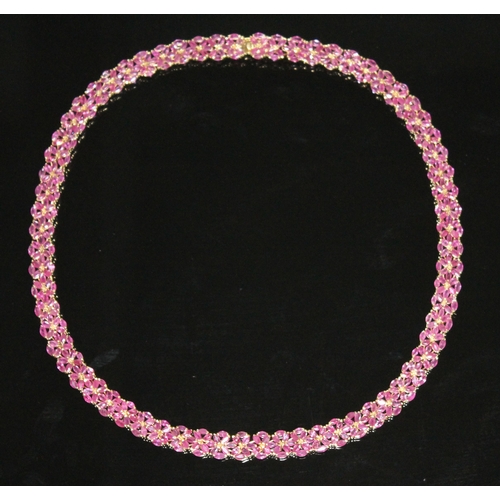 181 - A pink sapphire collar necklace comprising 474 marquis cut pink sapphires weighing approx. 23 carats... 