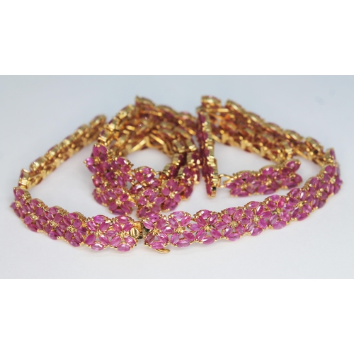 181 - A pink sapphire collar necklace comprising 474 marquis cut pink sapphires weighing approx. 23 carats... 