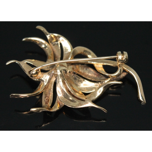 209 - A modern floral brooch set with a cultured pearl, hallmarked 9ct gold, sponsors mark 'RJ', London 19... 