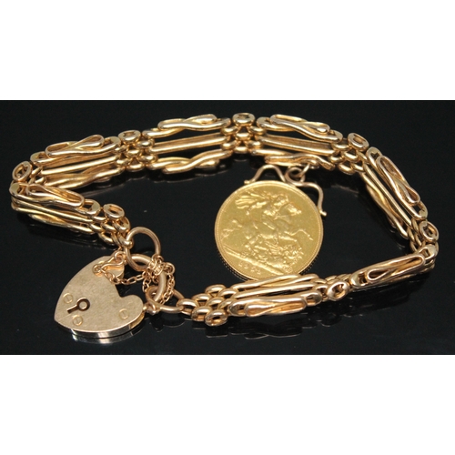 262 - A hallmarked 9ct gold bracelet with mounted Elizabeth II 1959 sovereign, gross weight 28.67g.