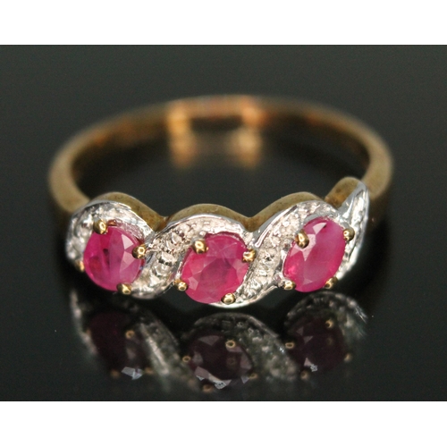 273 - A hallmarked 9ct gold ruby and diamond cluster ring, gross weight 1.68g, size M.