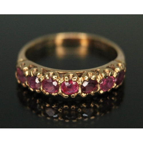 275 - A hallmarked 9ct gold seven stone ruby ring, gross weight 2.17g, size M.