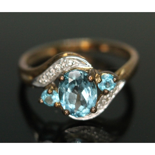 276 - A hallmarked 9ct gold blue topaz and diamond ring, gross weight 2.57g, size P.