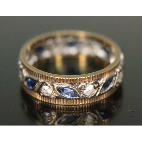 284 - A hallmarked 9ct white and yellow gold set with marquis cut sapphires and colourless stones, gross w... 