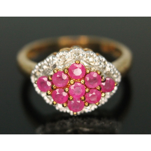 285 - A hallmarked 9ct gold diamond and ruby cluster ring, gross weight 2.72g, size L.