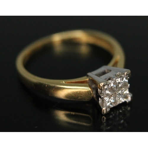 322 - A hallmarked 18ct gold four stone diamond ring, the cluster measuring approx. 5mm x 5mm, gross weigh... 