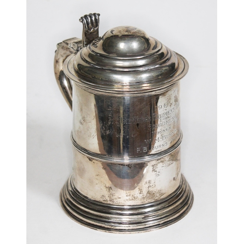 373 - A George V silver tankard with hinged domed lid and scroll thumb piece, inscribed '1941 The King's R... 