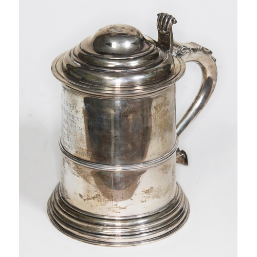 373 - A George V silver tankard with hinged domed lid and scroll thumb piece, inscribed '1941 The King's R... 