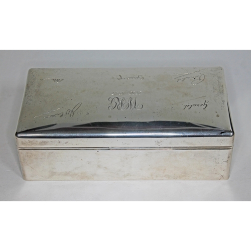 379 - A hallmarked silver cedar lined cigarette box, length 17cm.