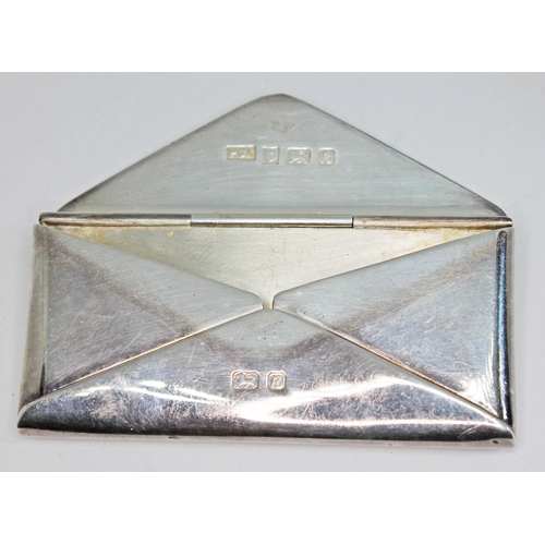 415 - A silver stamp case modelled as an envelope, Philip Kydd, Birmingham 1991, length 7.5cm, wt. 45.84g.