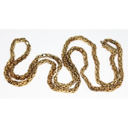 450 - A fancy link chain, 9ct gold import marks, length 61cm, weight 32.65g.