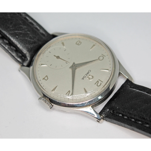 132 - A 1950 Omega 13322 stainless steel wristwatch with signed silvered dial having Arabic numerals, hour... 