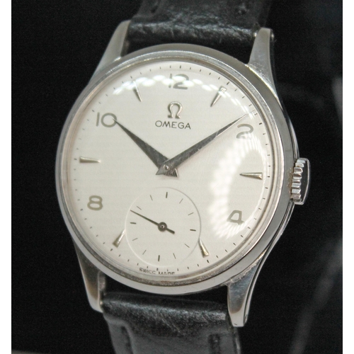 132 - A 1950 Omega 13322 stainless steel wristwatch with signed silvered dial having Arabic numerals, hour... 