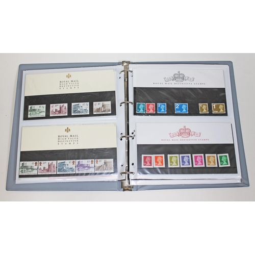 496 - An album of Royal Mail Prestige stamp books, presentation packs, and additional FDCs, mostly high va... 