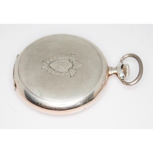 82 - A 1920s Omega silver cased open face pocket watch, the signed white enamel dial having ornate Arabic... 