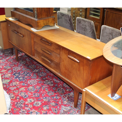 66 - A retro teak sideboard.