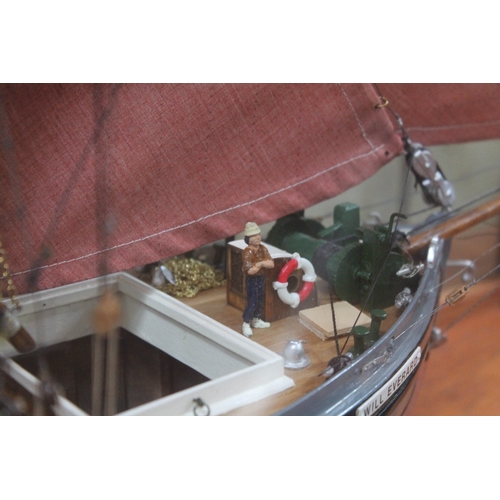 587 - A scratch-built model of the Thames sailing barge 'Will Everard' in glass display case, plaque reads... 