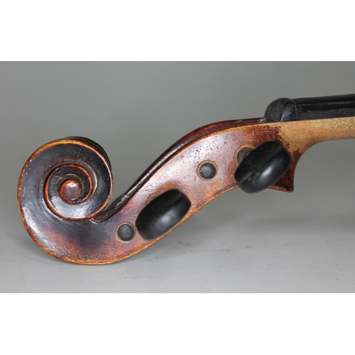 581 - A German violin, one piece back length 357mm, labelled 'Handarbeit aus Mittenwald', with two bows an... 