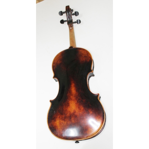 581 - A German violin, one piece back length 357mm, labelled 'Handarbeit aus Mittenwald', with two bows an... 