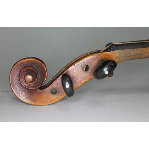 582 - An Italian Tecchler copy violin, one piece back length 357mm, bearing label, with wooden case and on... 