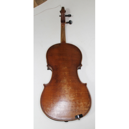 582 - An Italian Tecchler copy violin, one piece back length 357mm, bearing label, with wooden case and on... 