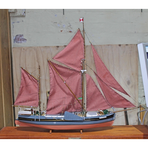 587 - A scratch-built model of the Thames sailing barge 'Will Everard' in glass display case, plaque reads... 