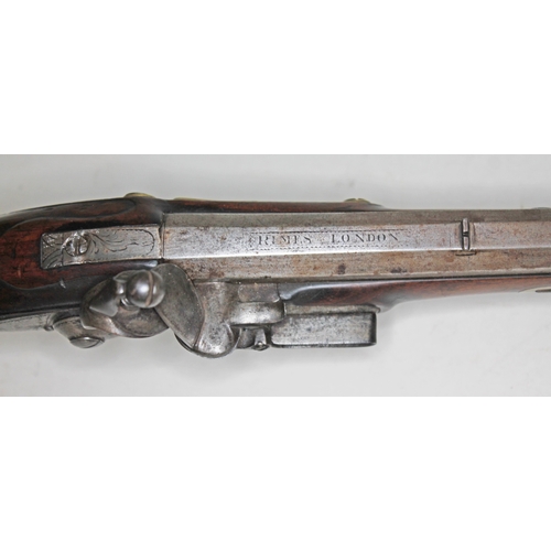 594 - A flintlock musket, circa 1800, 42cm octagonal barrel marked 'Rimes London', engraved plate also mar... 