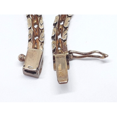 147 - A link necklace, length 44cm, 9ct gold import marks, weight 18.01g.