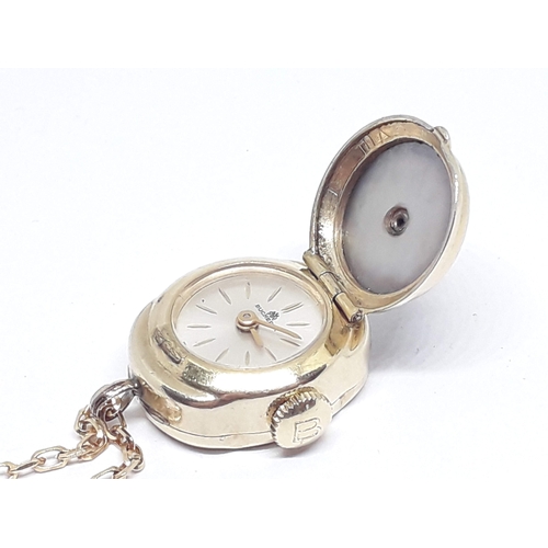 98 - A vintage Carl F Bucherer 17 jewel manual wind pendant watch inside gold plated hinged pendant case ... 