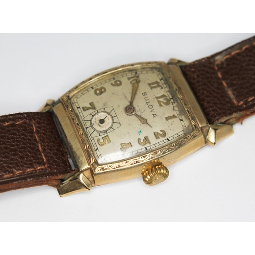 107 - A 1940s Bulova Watch Co Art Deco style gold plated manual wind wristwatch with signed champagne dial... 