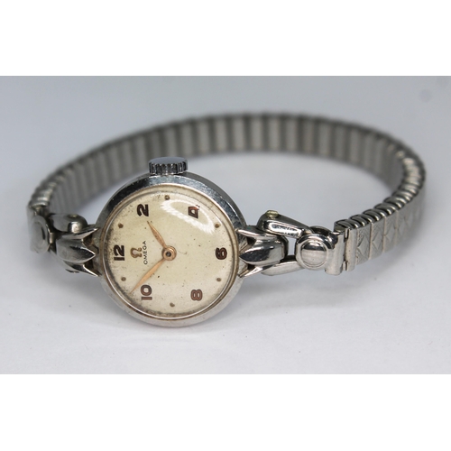 111 - A 1947 stainless steel Omega ladies wristwatch 2548-4, having signed champagne dial, Arabic numerals... 