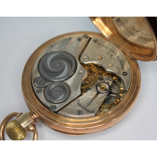 123 - A 1920s hallmarked 9ct gold Elgin open face pocket watch, the signed silvered dial having Art Deco A... 